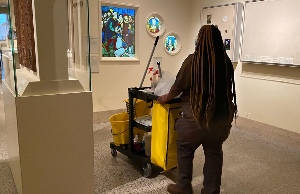 A cleaning woman at the Metropolitan Museum of Art in New York City