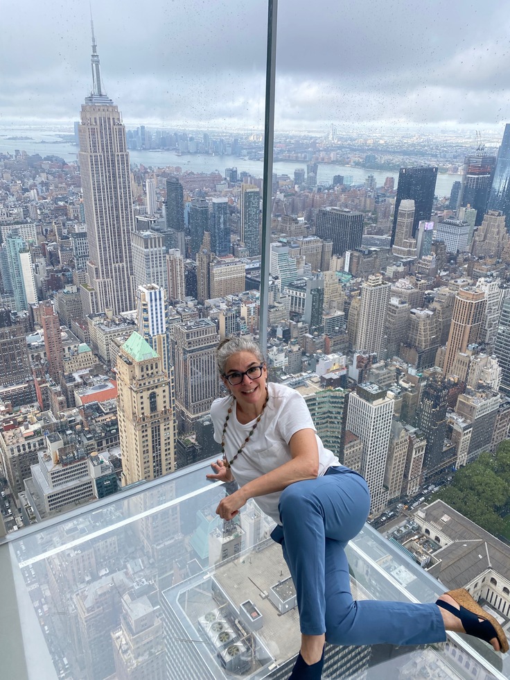 Best way to see SUMMIT One Vanderbilt observation deck in New York City: Pauline Frommer posing at SUMMIT One Vanderbilt in New York City