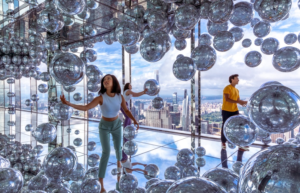 People playing with floating orbs at SUMMIT One Vanderbilt