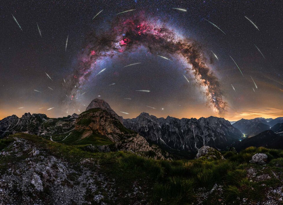 Milky Way and Perseid meteor shower over the Julian Alps in Slovenia