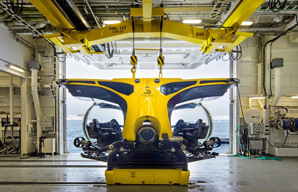Two yellow submarines are carried in the hold of the Octantis. 