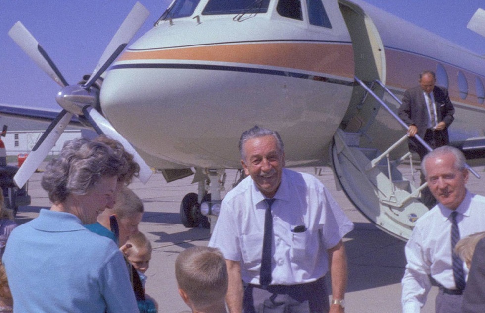 Walt Disney in front of his private plane in an archive image