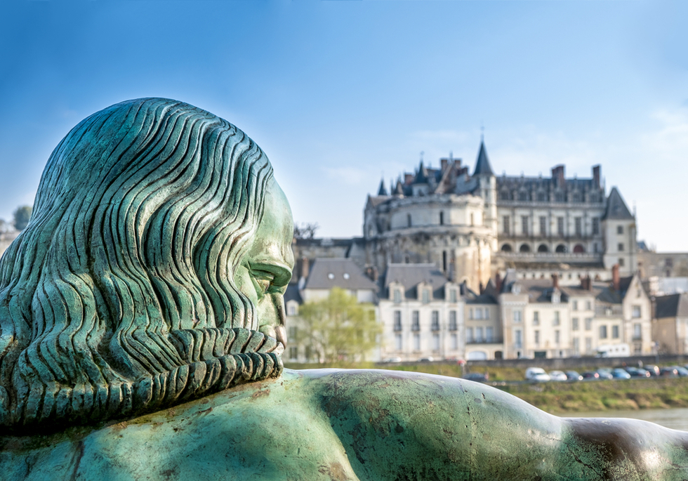 A close up look at a statue by Leonardo DaVinci in front of Amboise Chateau in the Loire Valley of France