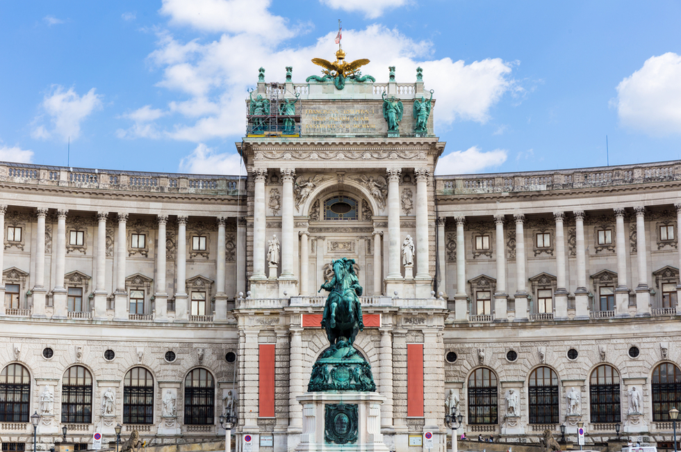 A photo of the Hofburg Neue Burg, with the statue of Prince Eugene in Vienna, Austria. It was here that Hitler announced the Anchluss which joined Austria to the Third Reich