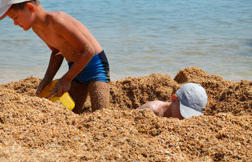 Why Digging Holes at the Beach Is So Dangerous, Especially for Kids | Frommer's
