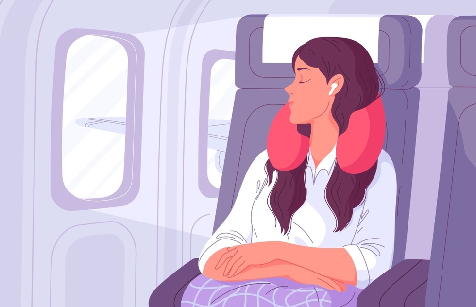 How to Sleep on a Long Plane Flight: 24 Tips to Try