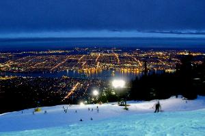 Nighttime view of downtown Vancouver, British Columbia from the slopes of Grouse Mountain.