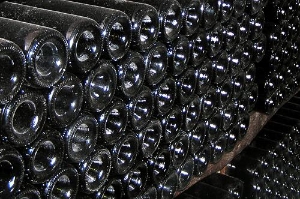 Wine bottles stacked at the Cascina Monsignore Farm