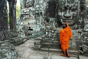 A monk at Angkor Wat in Siem Reap, Thailand. Photo by <a href="http://www.frommers.com/community/user_gallery_detail.html?plckPhotoID=61f45d4d-5dcc-4e9e-af2b-c8e987f9f240&plckGalleryID=c0482941-0d2d-4cca-b8c4-809ee9e20c72" target="_blank">dkosta/Frommers.com Community</a>