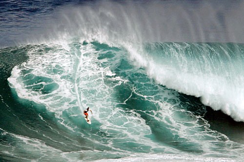 Each winter surfers are chewed up by 60-foot swells at Jaws off Pauwela Point.