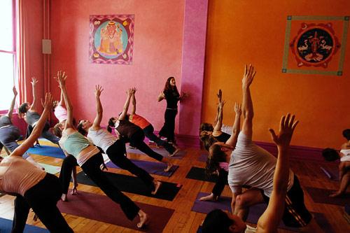 Dana Flynn commands the room at Laughing Lotus, in Chelsea. Courtesy Laughing Lotus Yoga Center