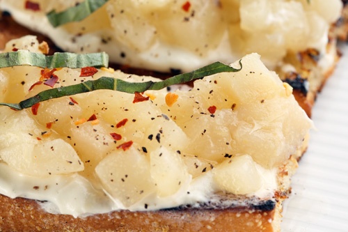 Whipped ricotta with grilled pears, aka 'Jewels on Toast' at Beauty & Essex, New York City. Photo: Melissa Hom