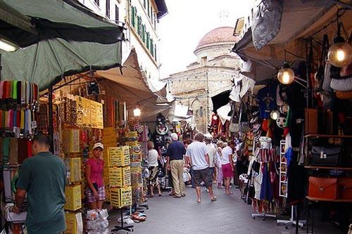 Shopping at San Lorenzo market in Florence, Italy.