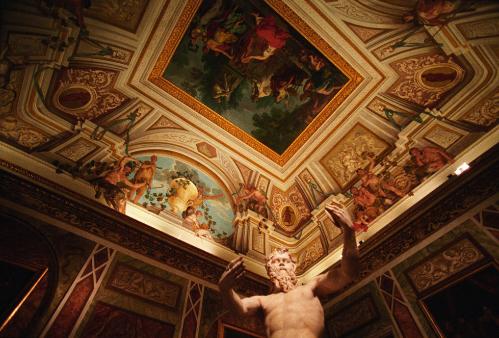 Bernini statue amid the ceiling frescoes at Villa Borghese.