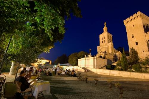 Dining al fresco at night in Avignon.