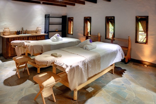 Each of the treatment rooms is its own little tree house, built at varying levels among the mature trees, with wooden, railed walkways connecting those rooms to the reception desk and lounges, which are also in tree houses. Like the hotel, the spa is on prime real estate -- within an UNESCO World Heritage Site on the island's southwest side, nestled between the two looming <em>pitons</em> (lush, green mountains) and on the shores of Sugar Beach. Locally made coconut oil is used for massages and you can request warmed bamboo sticks in lieu of hot stones. Post-treatment relaxation is in an open-air rotunda with the calming sounds of a creek running underneath.<br><br><strong>Contact: <a href="http://www.viceroyhotelsandresorts.com" target="_blank">Sugar Beach</a></strong><br><br><em></em>
