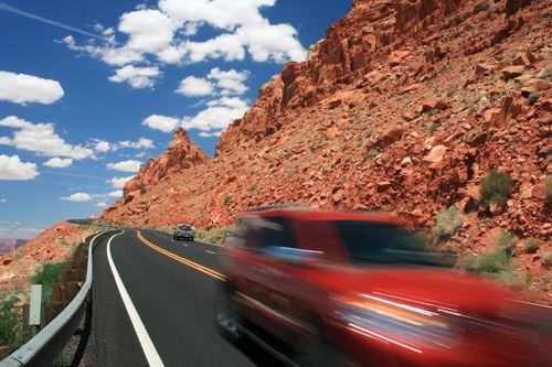 Red car on the road in Arizona. Photo: Aliaksandr Nikitsin/Dreamstime.com