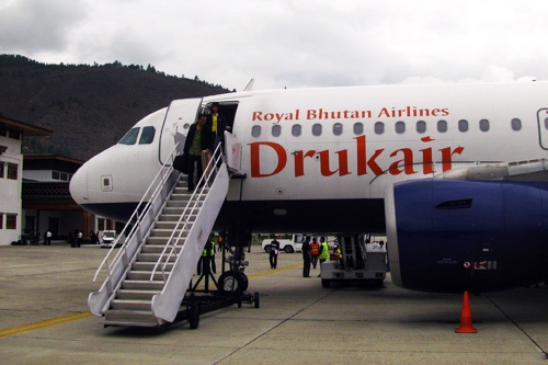 Druk Air passengers at Paro Airport, Bhutan.