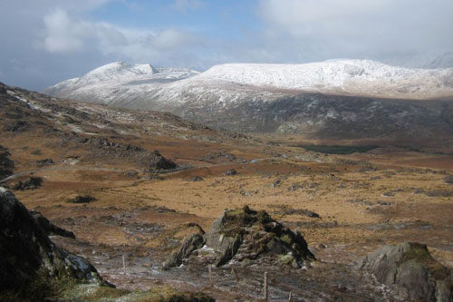 Snow on the rugged landscape of the Killarney National Park