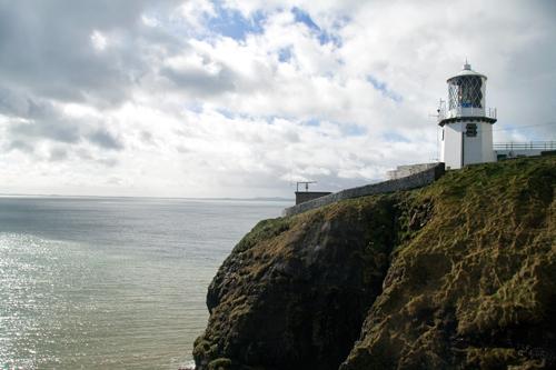 The Blackhead lighthouse on the coast of Northern Ireland near Belfast.