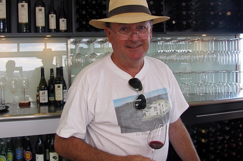 Man Smiling at Wine Bar