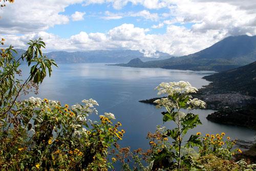 View over the lake and volcano from La Nariz peak, Lago Atitlan, Guatemala