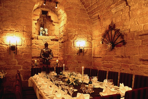 Dining table at Dalhousie Castle in Bonnyrigg, Scotland. Photo courtesy of Dalhousie Castle