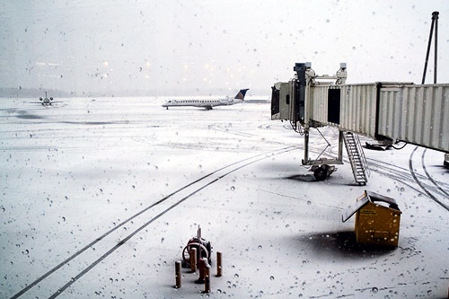 Planes arrive in a blizzard in Halifax, Nova Scotia, Canada.