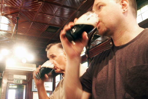 The author and his Dad, downing pints of Guinness at Dublin's venerable Stag's Head Pub. Photo: Matt Hannafin