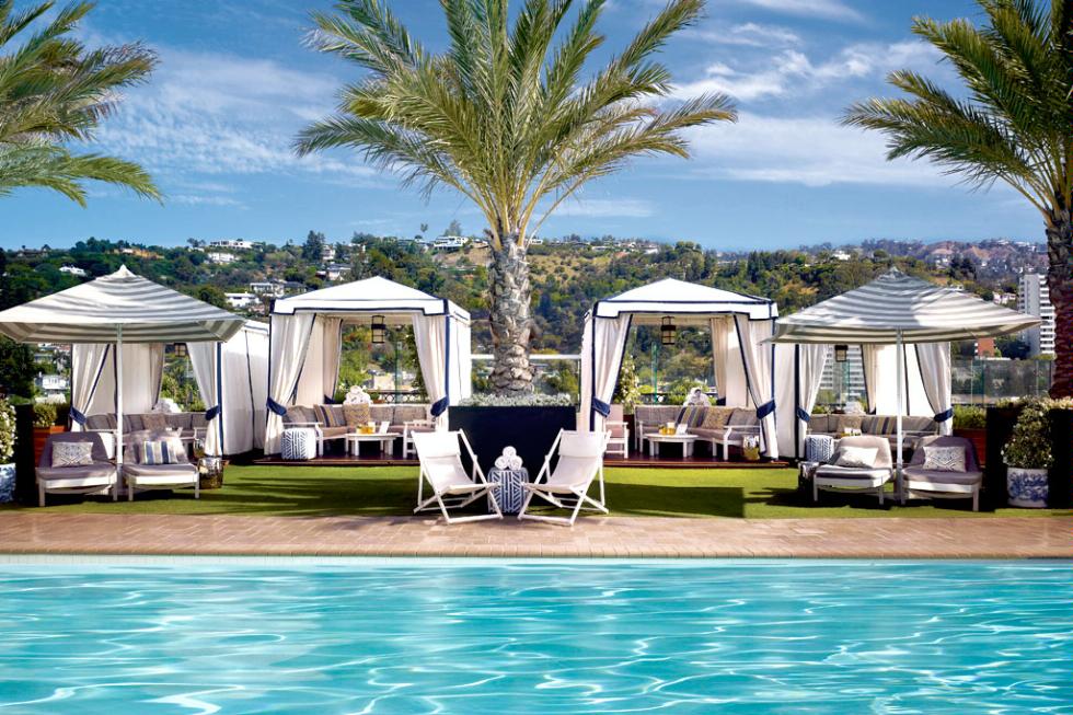 Cabanas and grass surround the rooftop pool at the London West Hollywood.