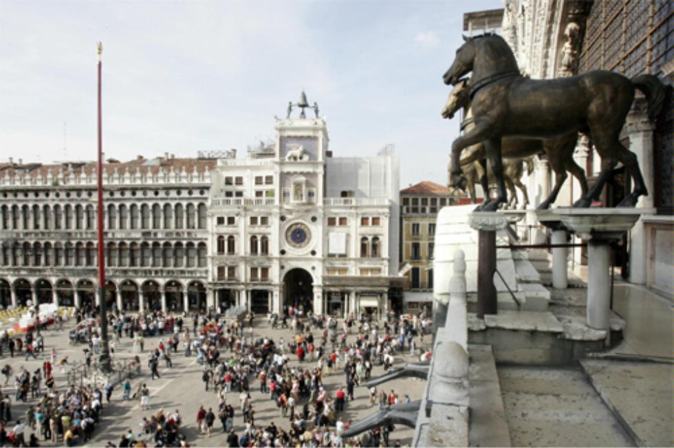 Bronze horses atop San Marco, with square below, Venice, Italy.
