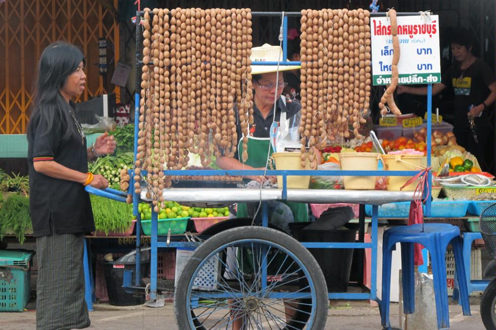 Food cart selling traditional Thai sausages.