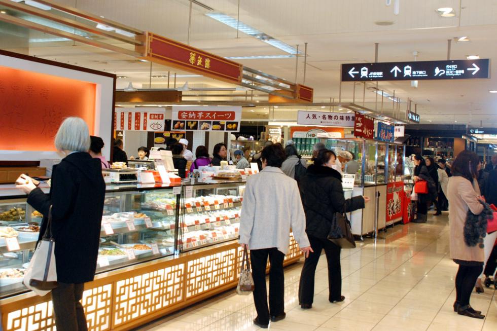 Shoppers at the food hall at the Takashimaya Times Square in Toyko, Japan.