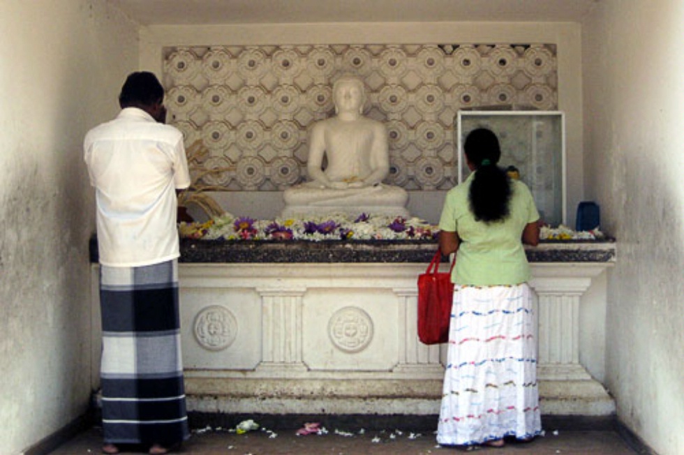 Worshippers leave offerings at the Buddhist temple at Kelaniya, near Colombo, Sri Lanka.