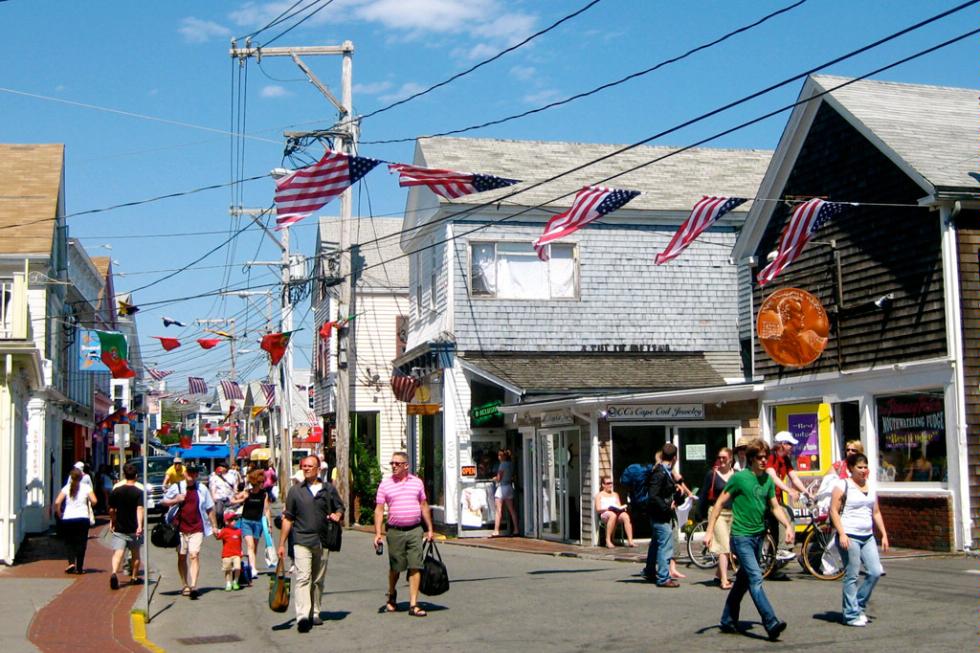 People strolling down Commercial Street, the main street of Provincetown, Massachusetts.