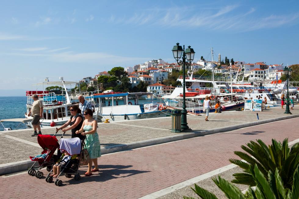 Day-to day life centers on the waterfront of Skiathos Town, Skiathos, Greece.