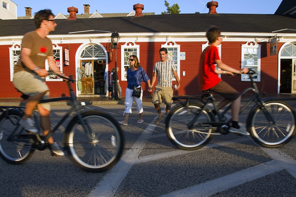 Cyclists in Dock Square in Kennebunk, ME.