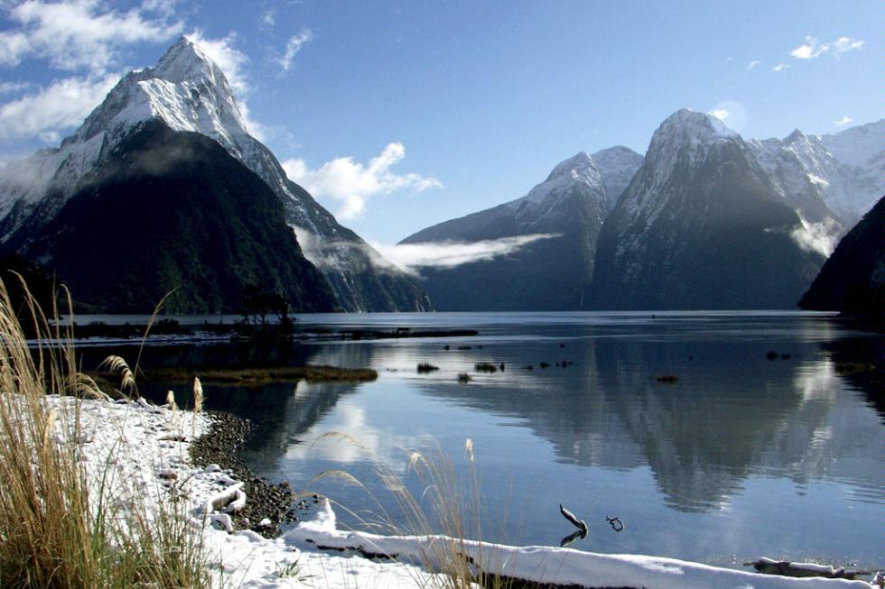 Snow on the ground in Milford Sound, New Zealand.