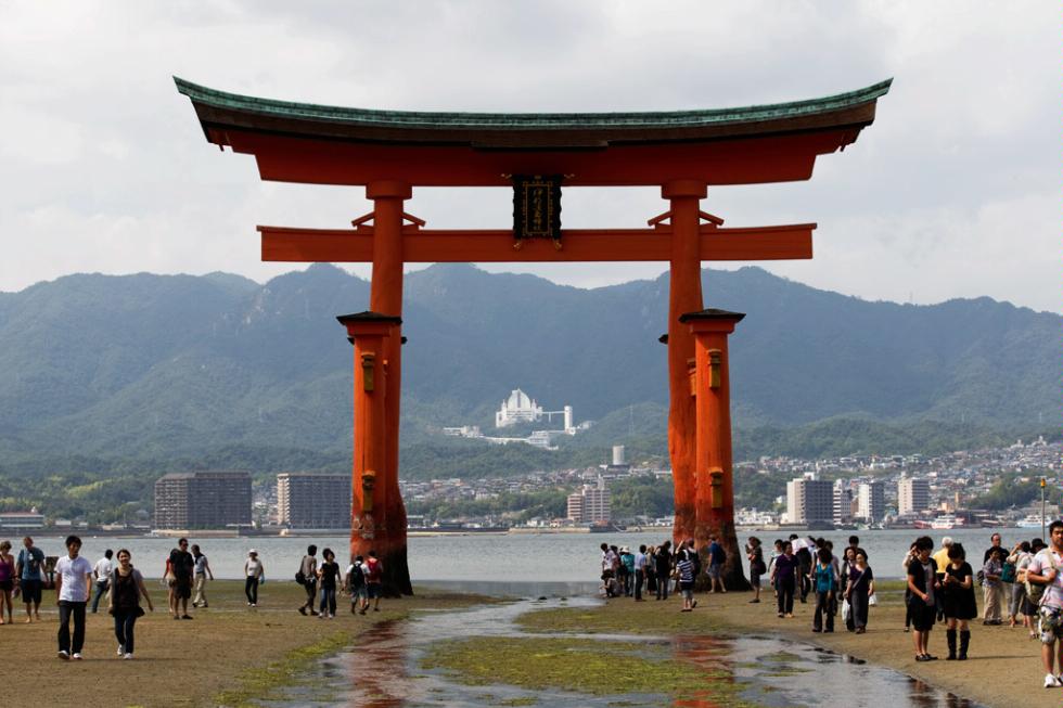Itsukushima Shrine gate rising out of waters, Hiroshima City.