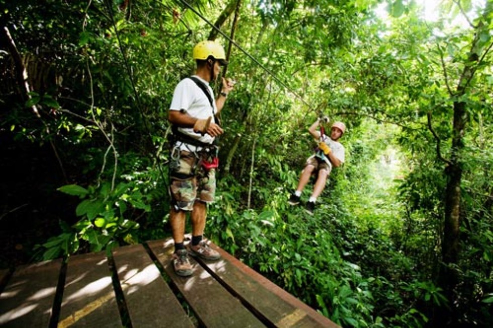 The Montezuma Waterfall Canopy Tour in Guanacaste takes visitors swinging through the treetops around the famous cascade.