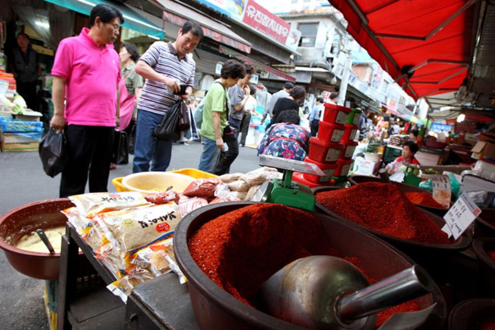 Spice sellers at the Namdaemun Market in Seoul, South Korea.