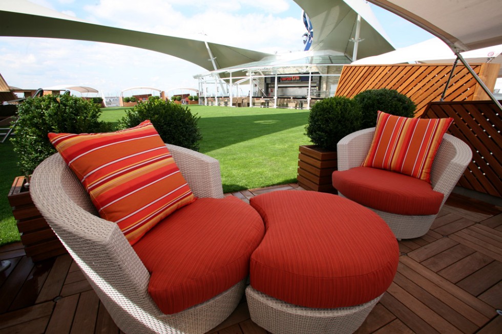 A private "Alcove" cabana looks out over Celebrity Silhoutte's Lawn Club.