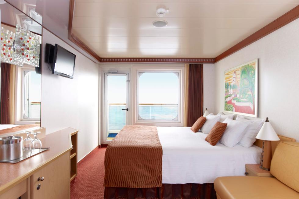 The stateroom of the Carnival Dream offers a balcony view of the ocean.