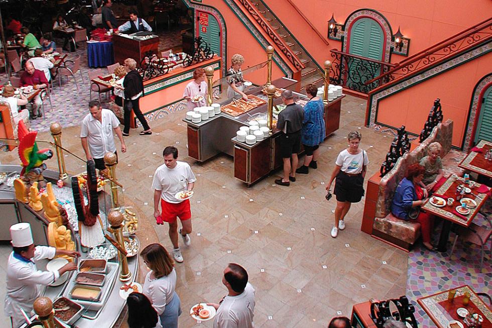 Passengers lining up for a fine meal at one of the Carnival Victory's many dining options.