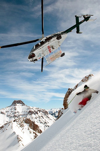 A helicopter guides a skier through Telluride's peaks. Courtesy Telluride Helitrax